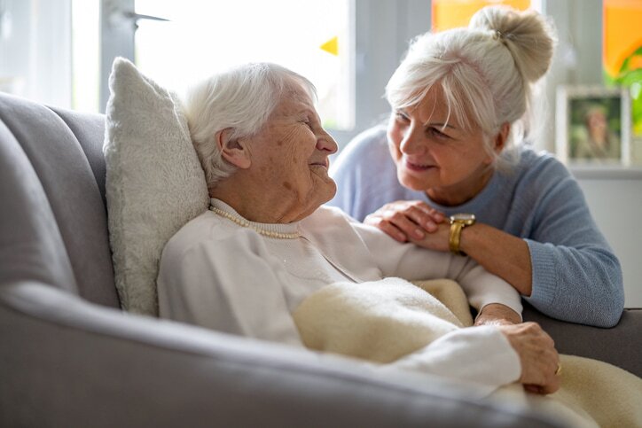 5 Ways Dementia Care Technology Enhances Safety and Engagement a woman taking care of another woman