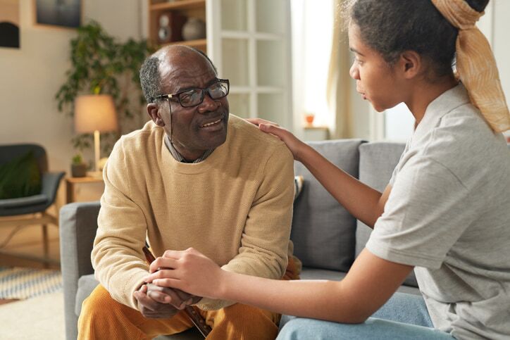 From Confusion to Comfort The Role of Validation in Dementia Care A woman comforting a man