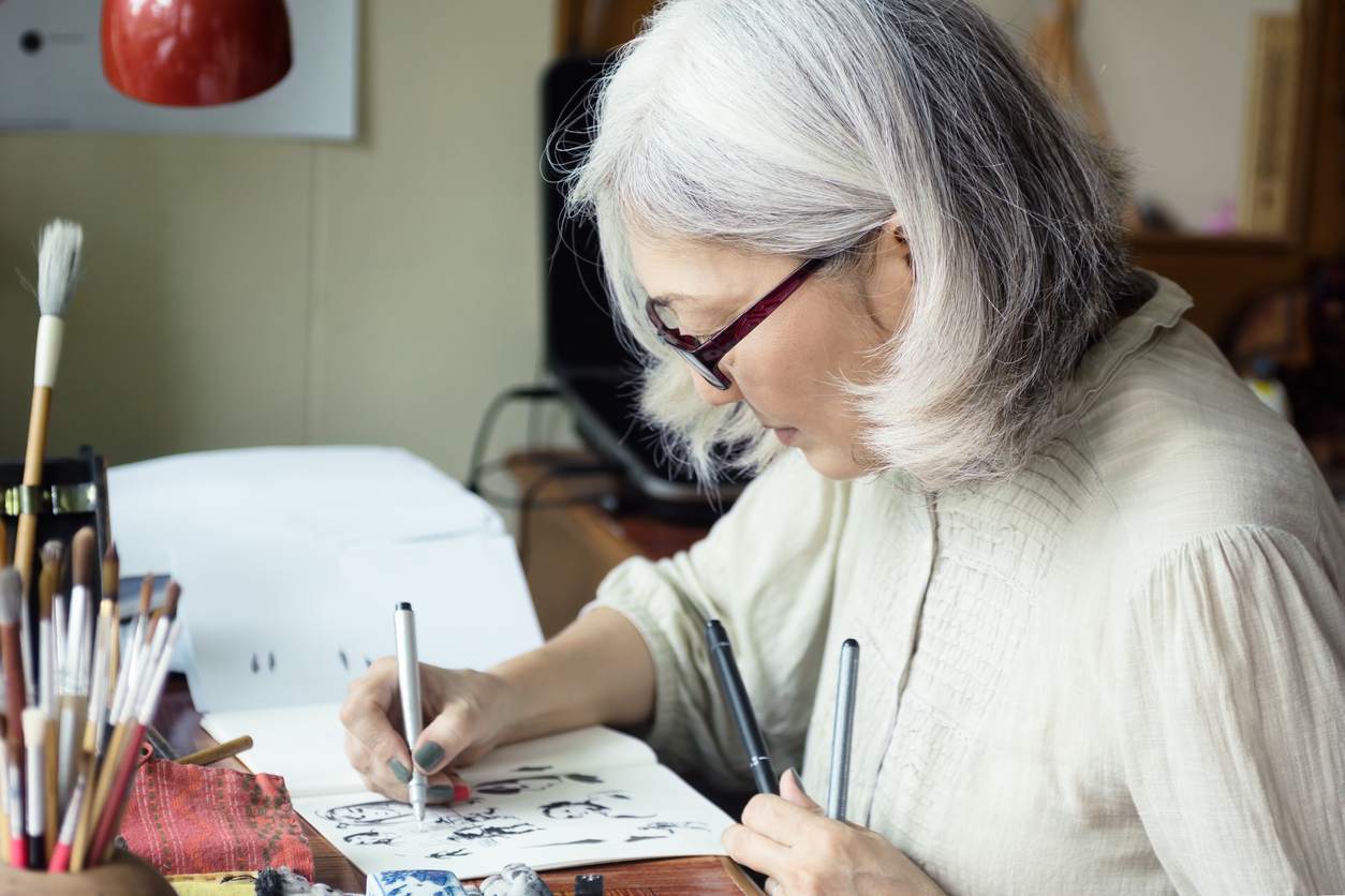 Incorporating the Arts into Dementia Caregiving a woman creating art